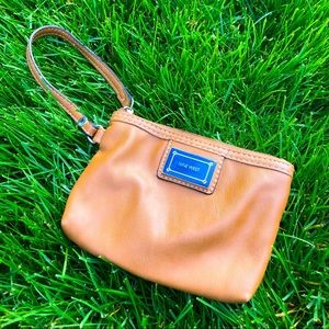 Tan Leather Nine West wristlet bag.